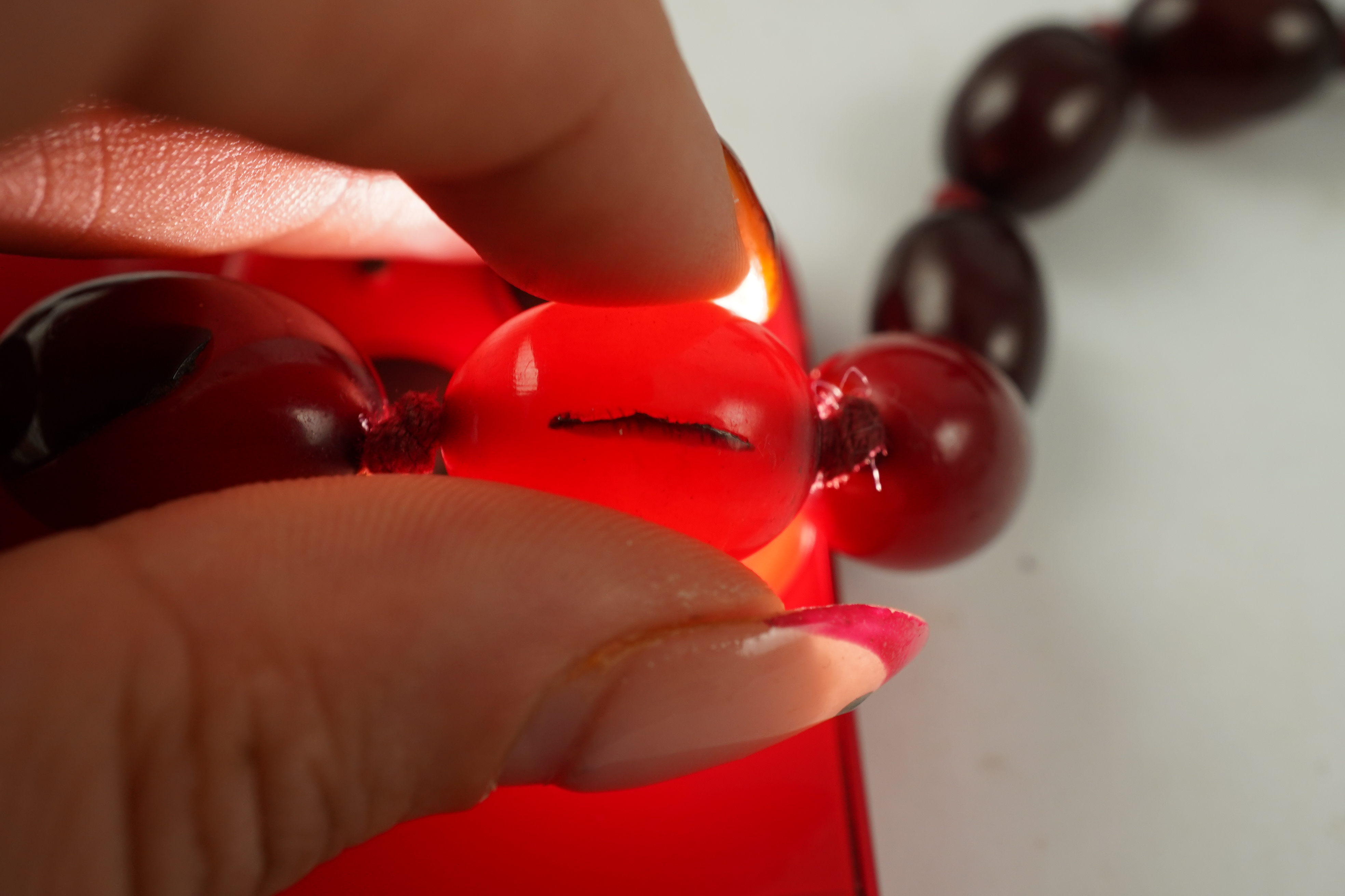 A cherry bakelite 'amber' necklace